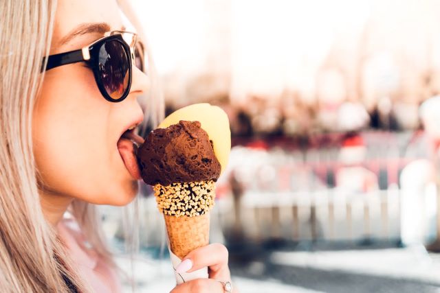 happy-girl-licking-chocolate-ice-cream.jpg